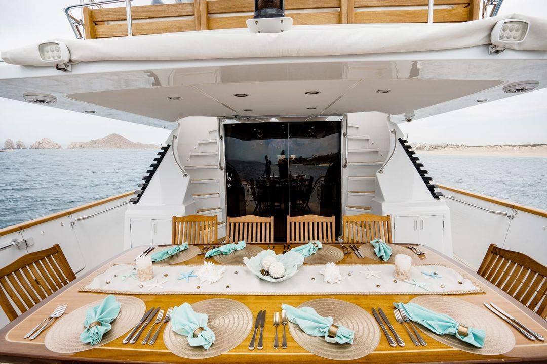 Table set for lunch on the aft deck of a Cabo San Lucas charter yacht