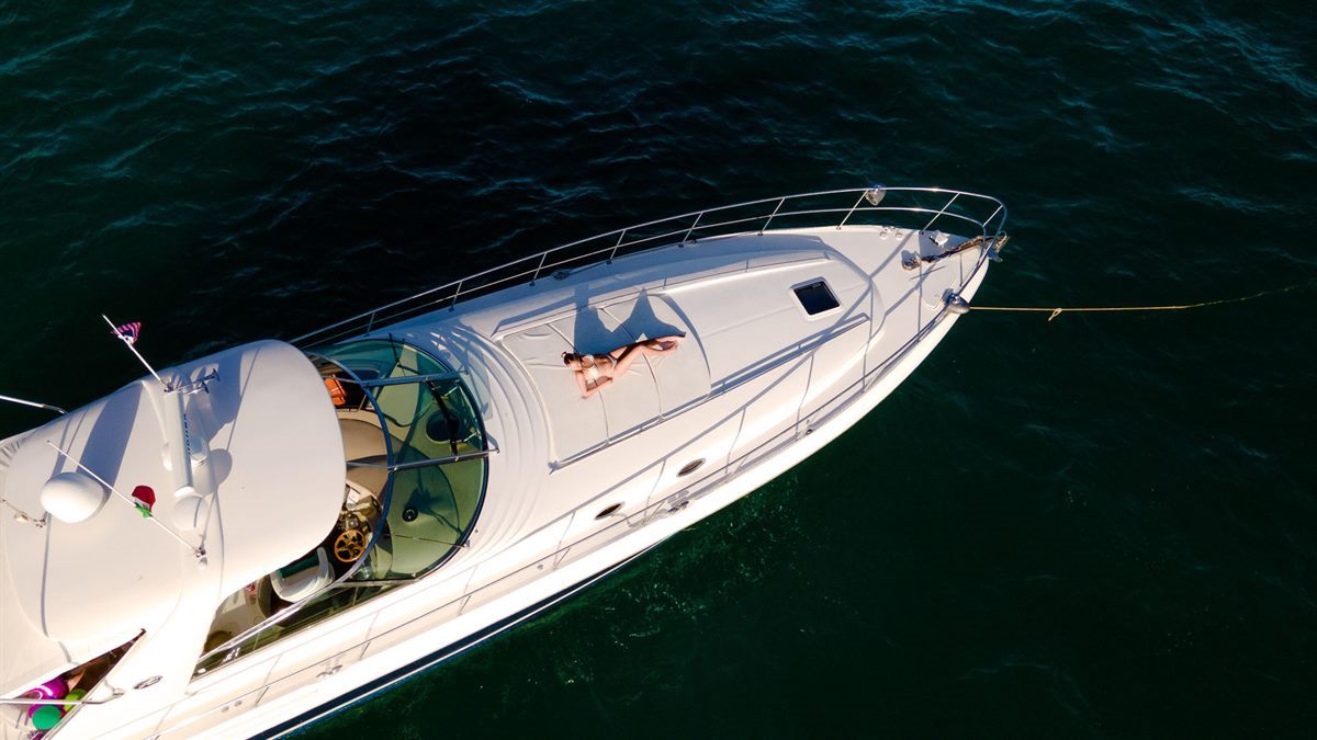 65 ft Sea Ray private yacht charter anchored off Cabo San Lucas